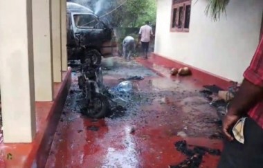 
A petrol bomb attack took place on a house in Kokkuvil in Jaffna today, Jaffna based media reported.

The attackers had arrived on motorcycles and threw petrol bombs towards the house.

A van and two motorcycles parked outside the house had been completely destroyed in the attack.

The front part of the house was also damaged in the attack. 
